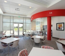 Community dining and social lounge with kitchen at The Trio at ENCORE!