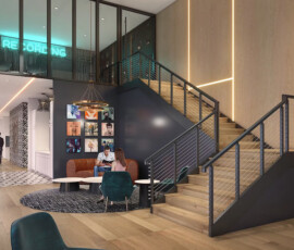 Modern loft-style lobby with two-story height, metal staircase with cable railing, brown leather seating nook beneath mezzanine level, digital screens, minimalist interior design with warm wood and dark accents.